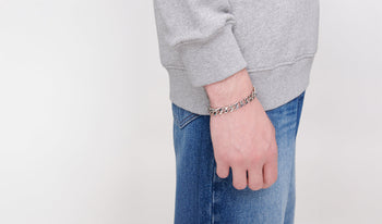 A.P.C. Men's Jewelry - Man wearing bracelet.