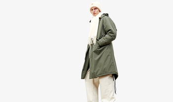 A.P.C. Men's Scarves - Man wearing matching grey beanie, scarf, and sweater.
