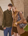 A.P.C. Fall, Winter 2024 - woman and man model embracing wearing A.P.C. Fall collection pieces