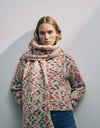 A.P.C. Women Gift Me More - Woman wearing multicolor wool scarf and sweater.
