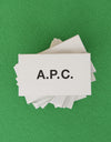 A.P.C. Gift Cards - White gift card envelope with A.P.C. logo on green background.