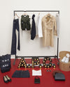 A.P.C. Essential Gifts - Display of classic A.P.C. items like tote bags, demi lune, t-shirt, jeans.