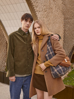 A.P.C. The Brand - Woman and Man standing together on campus.