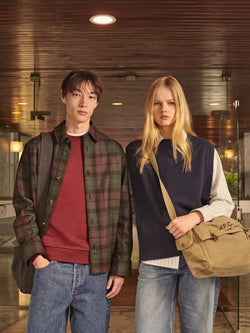 A.P.C. The Brand - Woman and Man standing in front of university.