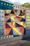 A.P.C. quilts in midair against a tiled wall