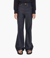 A.P.C. Women Flared Jeans - Woman wearing flared jeans to show fit.