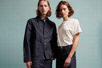 A.P.C. Denim - Man and woman standing wearing denim jacket and white t-shirt with jeans.