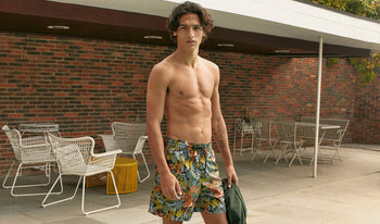 A.P.C. Men Sale Pants, Shorts - Woman and man standing together in fall clothing.