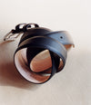 A.P.C. Gifts for Him - a belt on a wood table