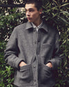 A.P.C. jackets - man model standing in a Fall outfit with his hands in-pocket