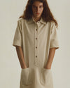 A.P.C. Women - woman standing in a dress with hands in pocket