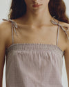 A.P.C. New Arrivals - close up of woman's torso in a summer tanktop