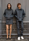 two models standing side by side, wearning full denim outfits
