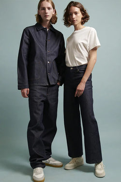 A.P.C. Denim - Man & Woman standing together wearing denim jacket and jeans.