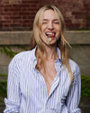 Woman wearing A.P.C Marc Jacobs shirt with a necklace in her mouth