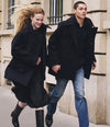 A.P.C. Fall/Winter 25 - Man and Woman holding hands wearing wool coats in France.