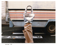 Silver Tote bag on roll of kraft paper